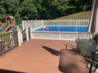 New deck next to a swimming pool